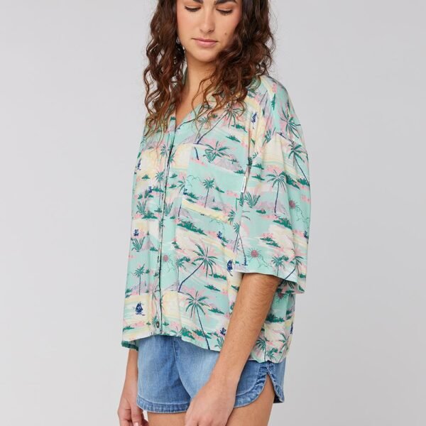 Sisstrevolution Honolulu Shirt in Light Jade with tropical print, front view.