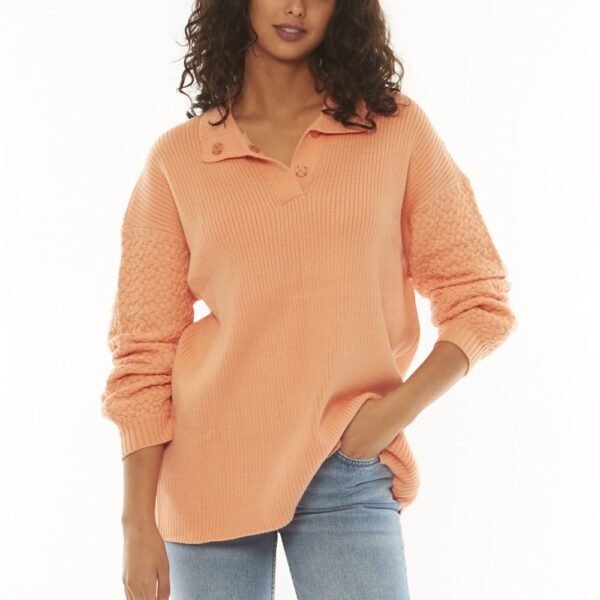 Sisstrevolution Flint LS Sweater in sorbet, featuring textured sleeves and a relaxed fit.