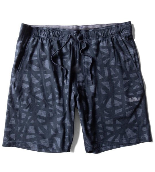 Vissla Comp Lite 18-inch elastic walkshort in dark navy with geometric pattern, front view.