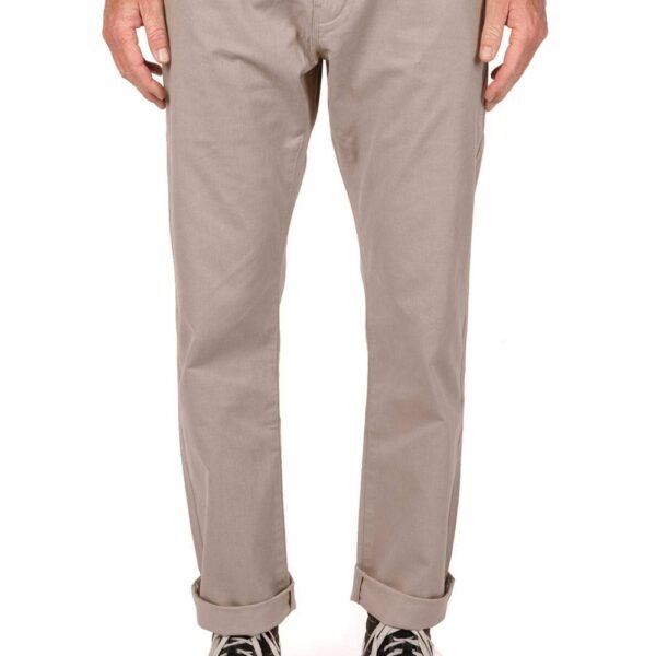 Vissla Creators Port Chino Pant in khaki, front view with cuffed hem.