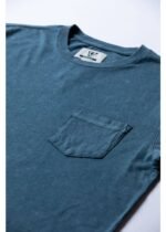 Close-up of Vissla Solid Sets Pkt Tee pocket and neckline in sea water color.