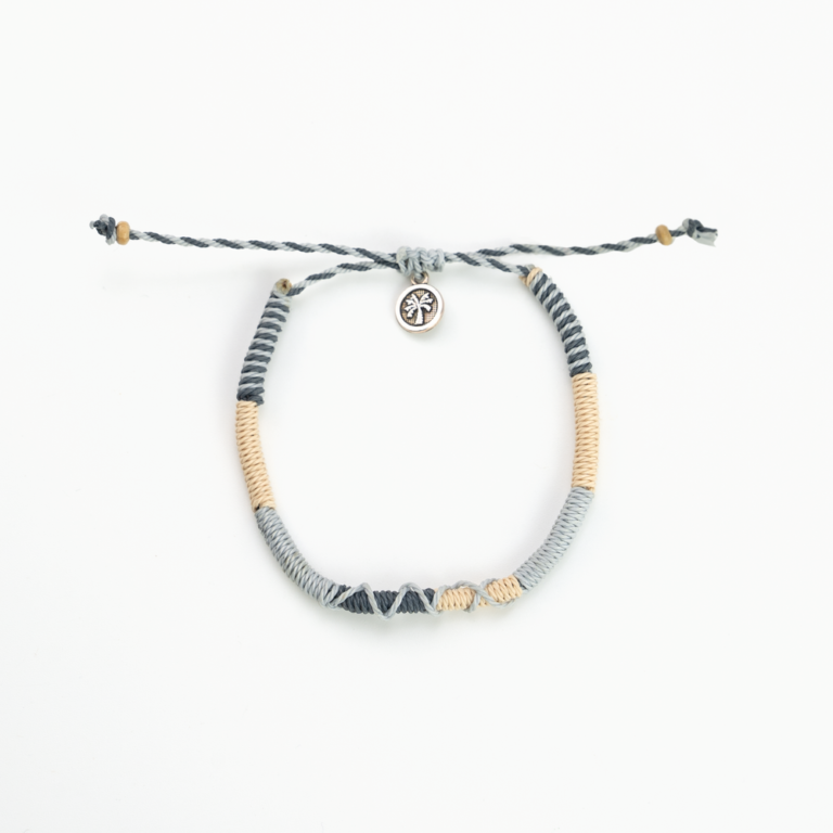 Stylish Pineapple Island anklet SNGA-003 with woven design and charm.
