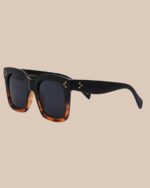 I-Sea Waverly sunglasses in black tort with G15 polarized lenses, side angle.