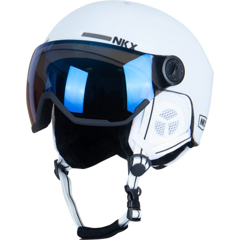 NKX Impact snowboard/ski helmet in white with integrated visor.